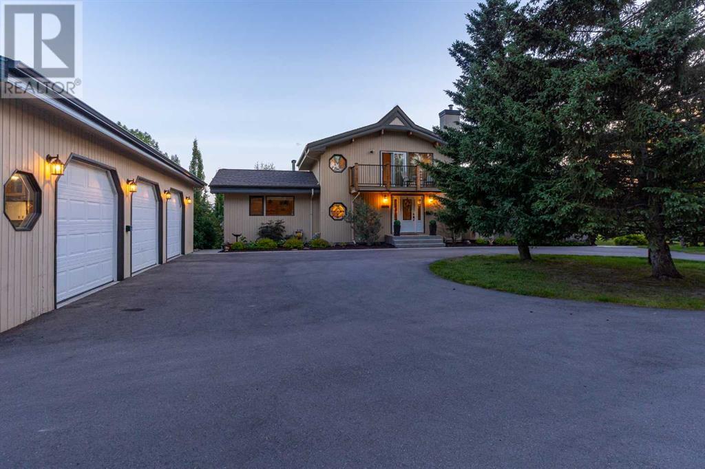 Property at 116 Bearspaw Village Crescent image 4