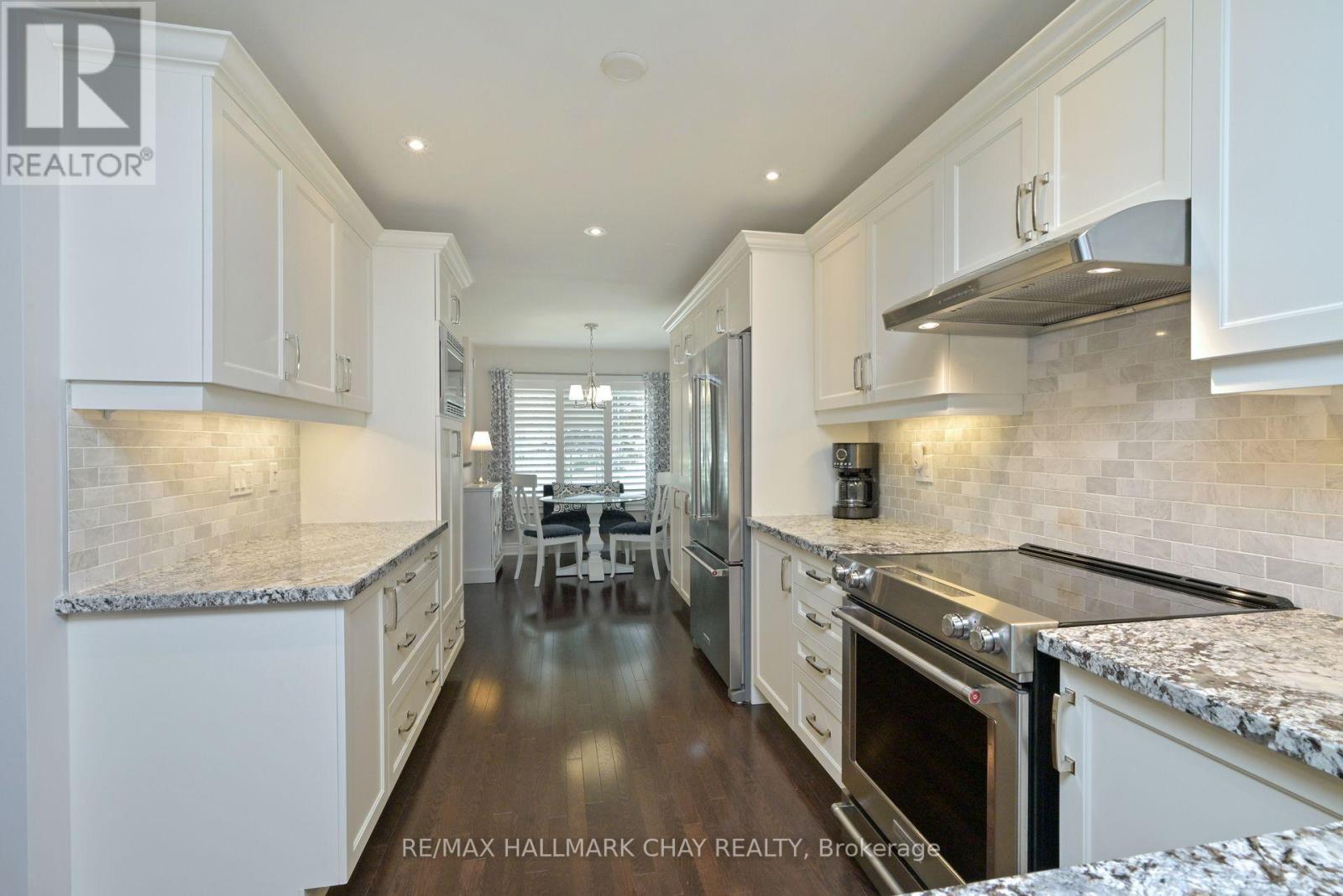 39 Westmount Drive, New Tecumseth, Ontario  L9R 0P5 - Photo 9 - N12276266