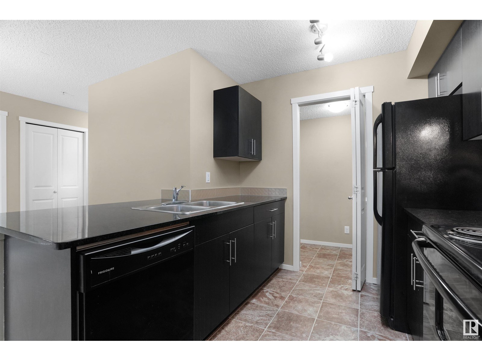 Property at #214 5816 MULLEN PL NW image 4