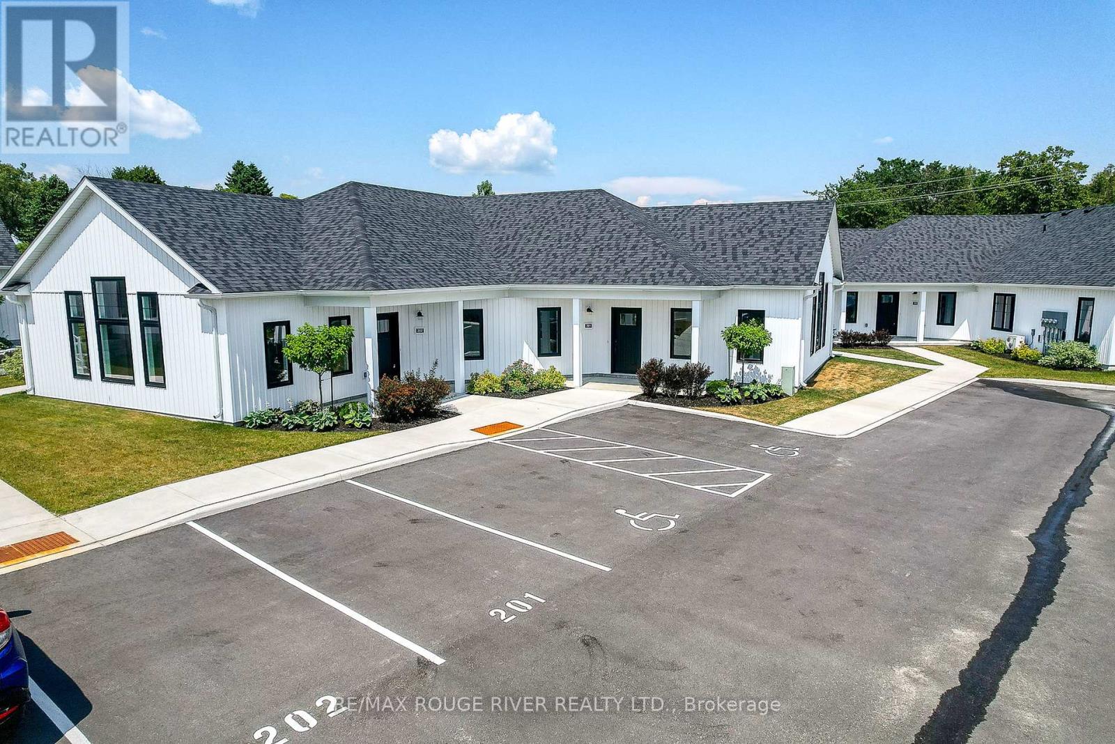 201 - 14 Meadowcreek Drive, Brighton, Ontario  K0K 1H0 - Photo 1 - X12247997