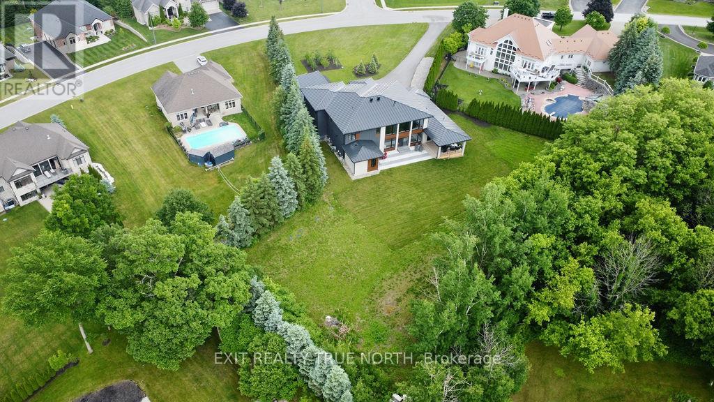 57 Glenhuron Drive, Springwater, Ontario  L4M 6T4 - Photo 45 - S12181041