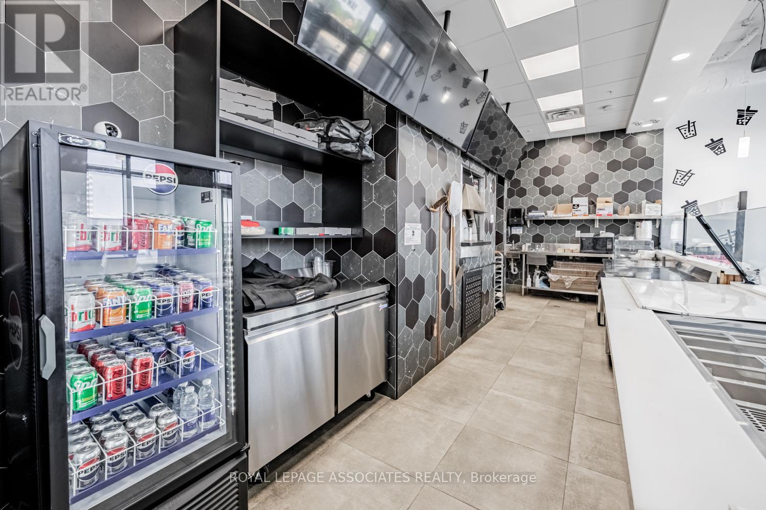 B - 205 Queen Street E, Brampton (Queen Street Corridor), Ontario  L6W 0C8 - Photo 14 - W12279587