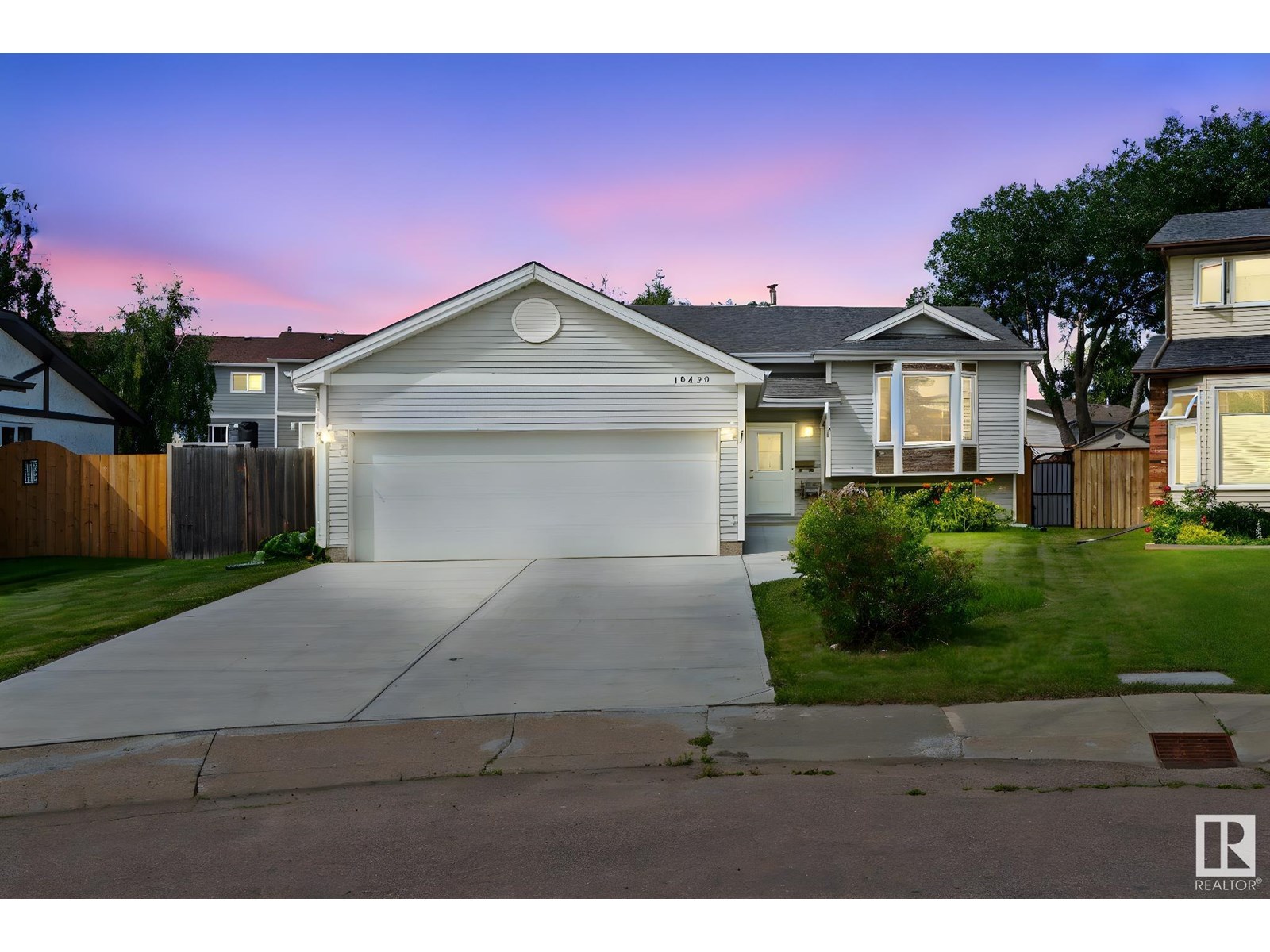 Property at 10458 14 AV NW NW image 1