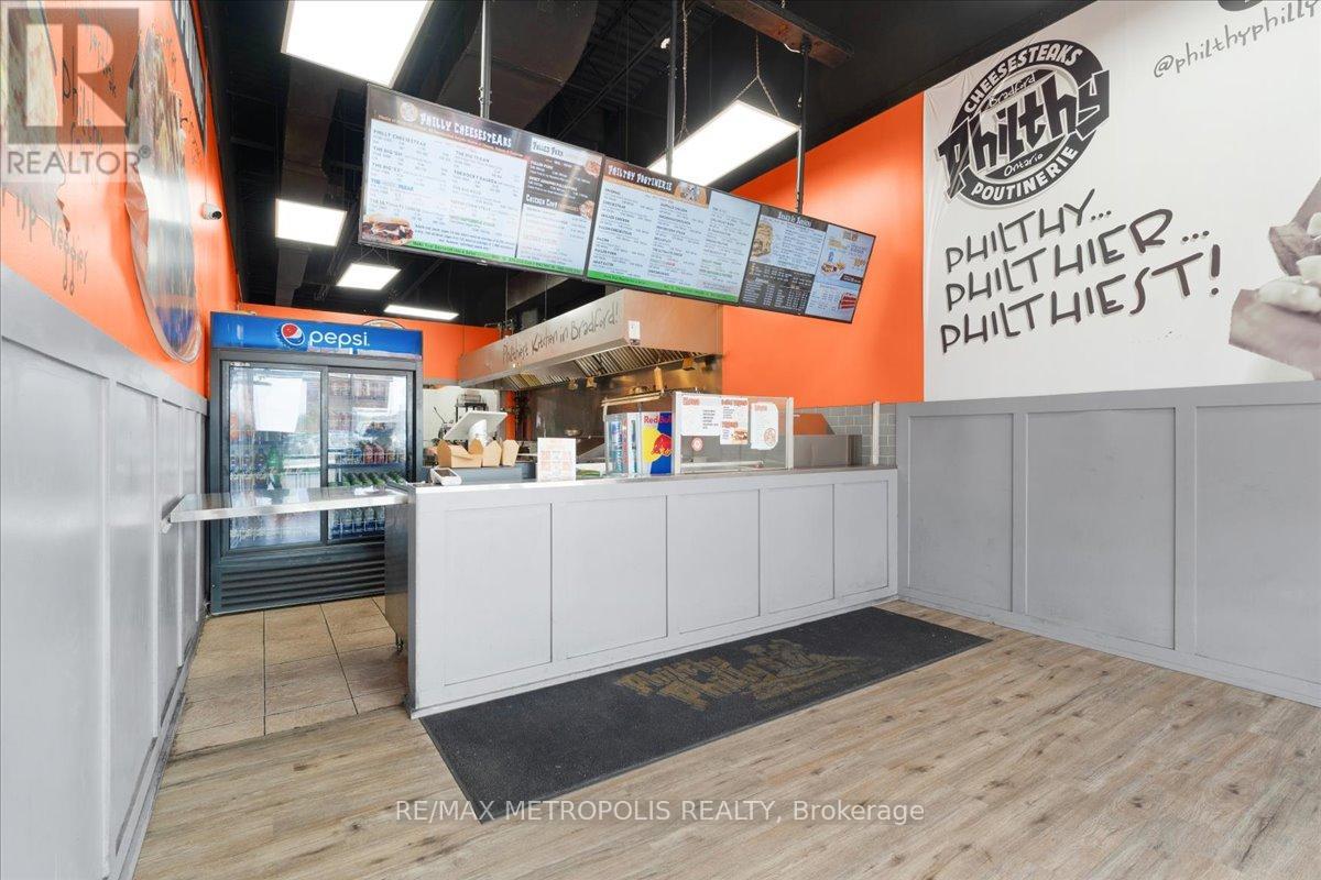 10 - 450 Holland Street W, Bradford West Gwillimbury (Bradford), Ontario  L3Z 0J4 - Photo 2 - N12280442