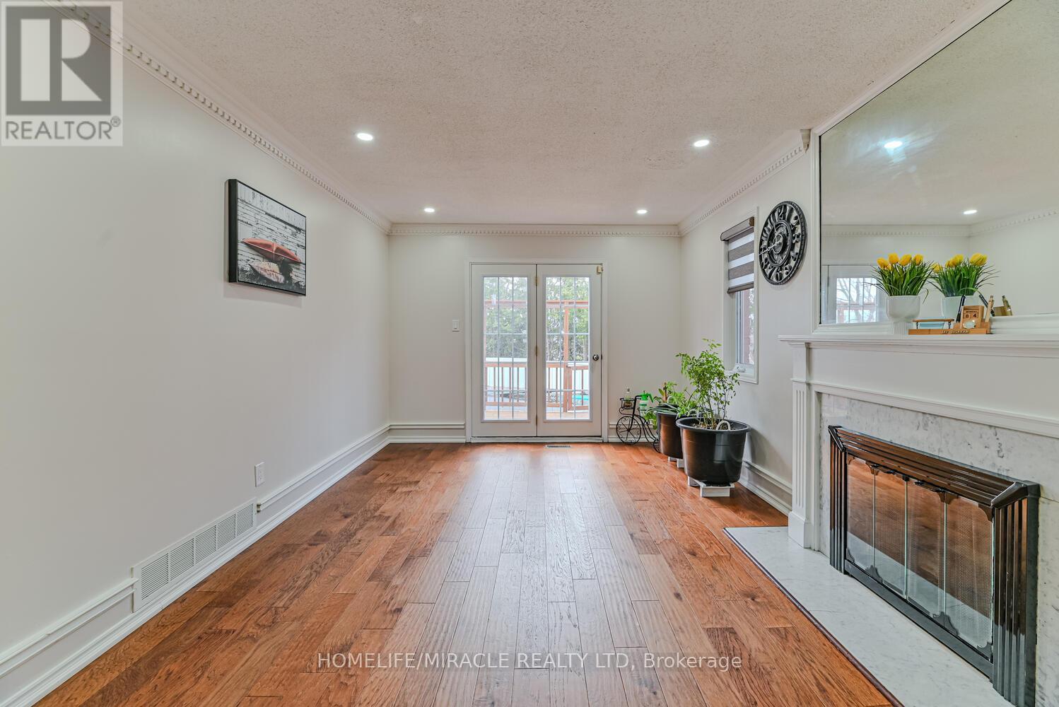 32 Plover Place, Brampton (Fletcher's Creek South), Ontario  L6W 4C4 - Photo 6 - W12281192