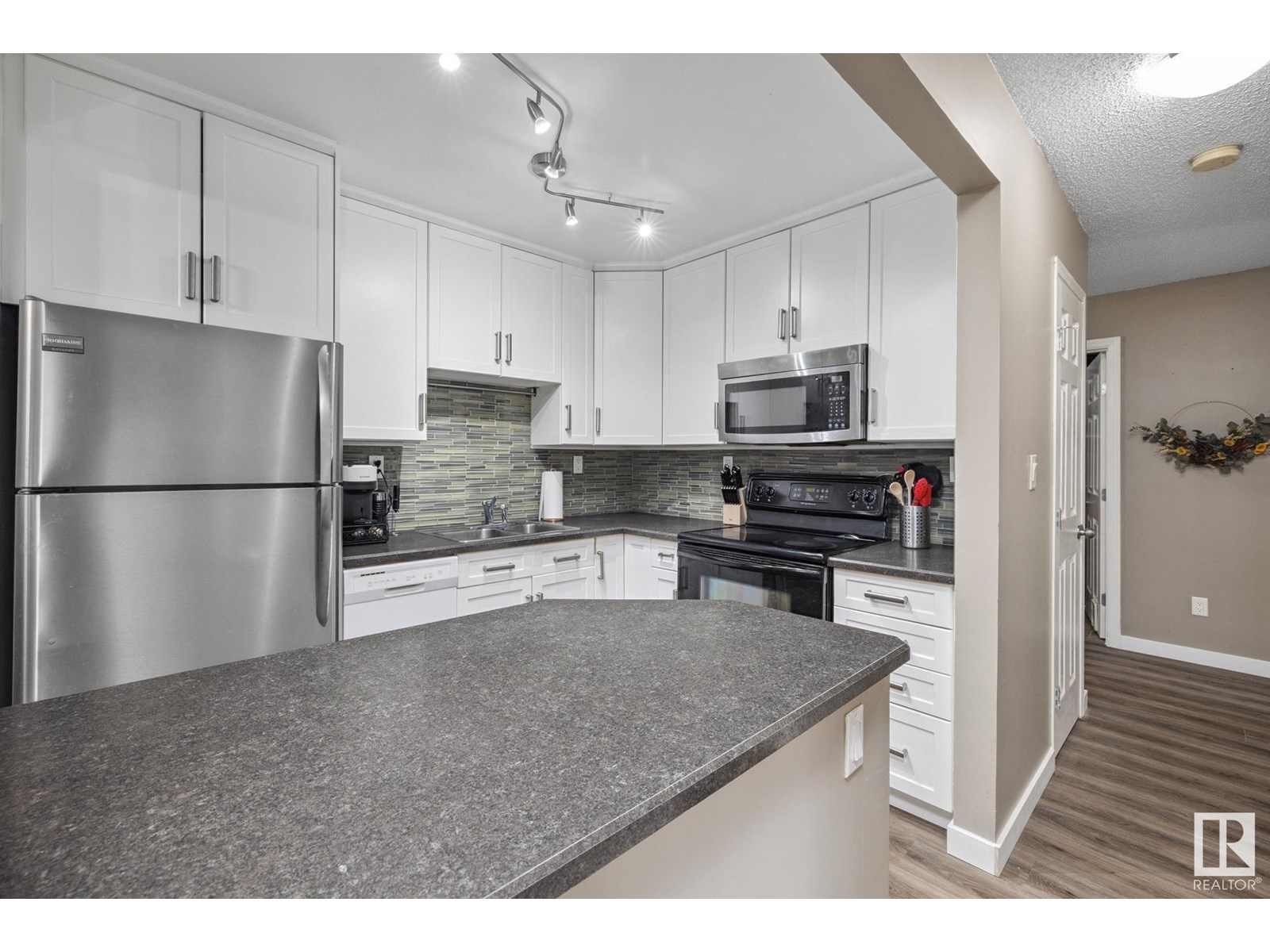 Property at #310 1624 48 ST NW image 4