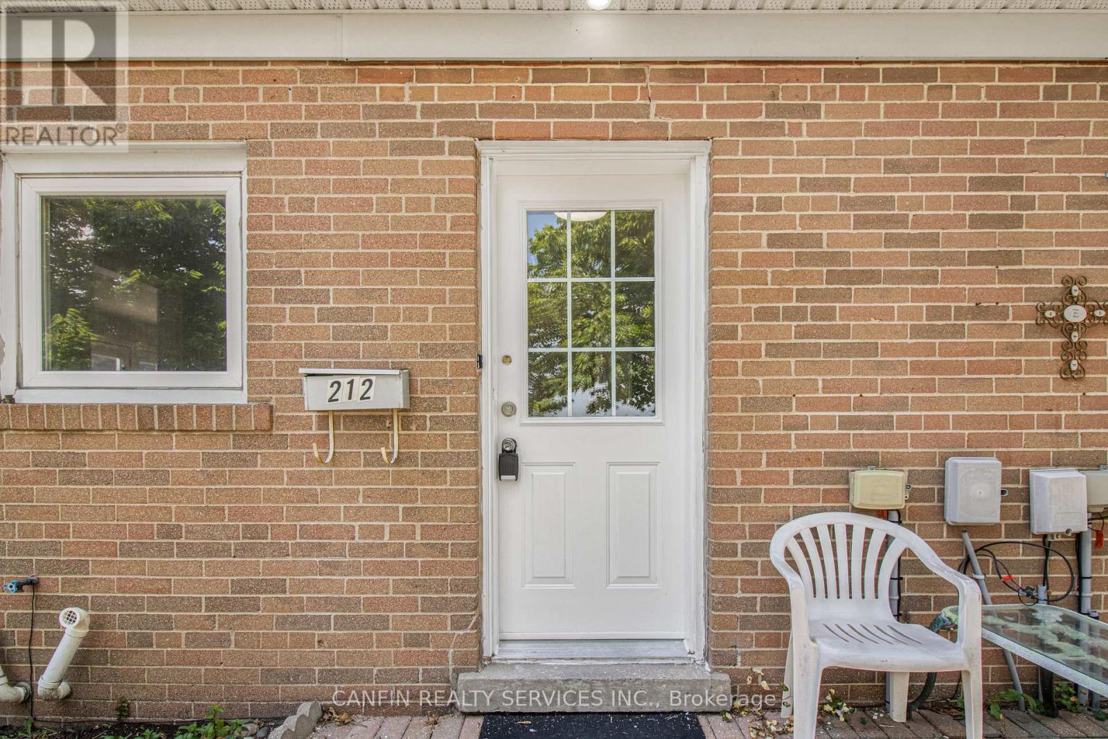 Property at 212 - 212 TOWN HOUSE CRESCENT image 1