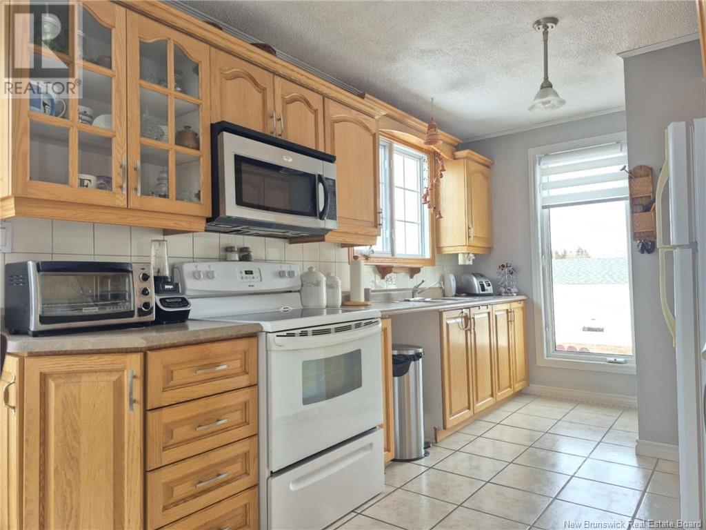 210 Rue Francine, Beresford, New Brunswick  E8K 1N8 - Photo 2 - NB115607