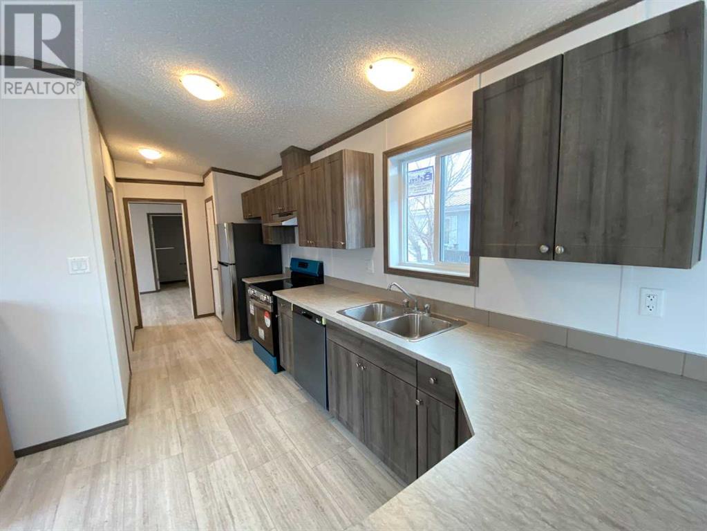 19 Maple Drive W, Brooks, Alberta  T1R 1H8 - Photo 6 - A2171250