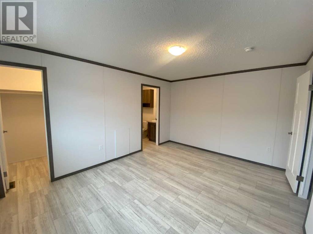 19 Maple Drive W, Brooks, Alberta  T1R 1H8 - Photo 8 - A2171250