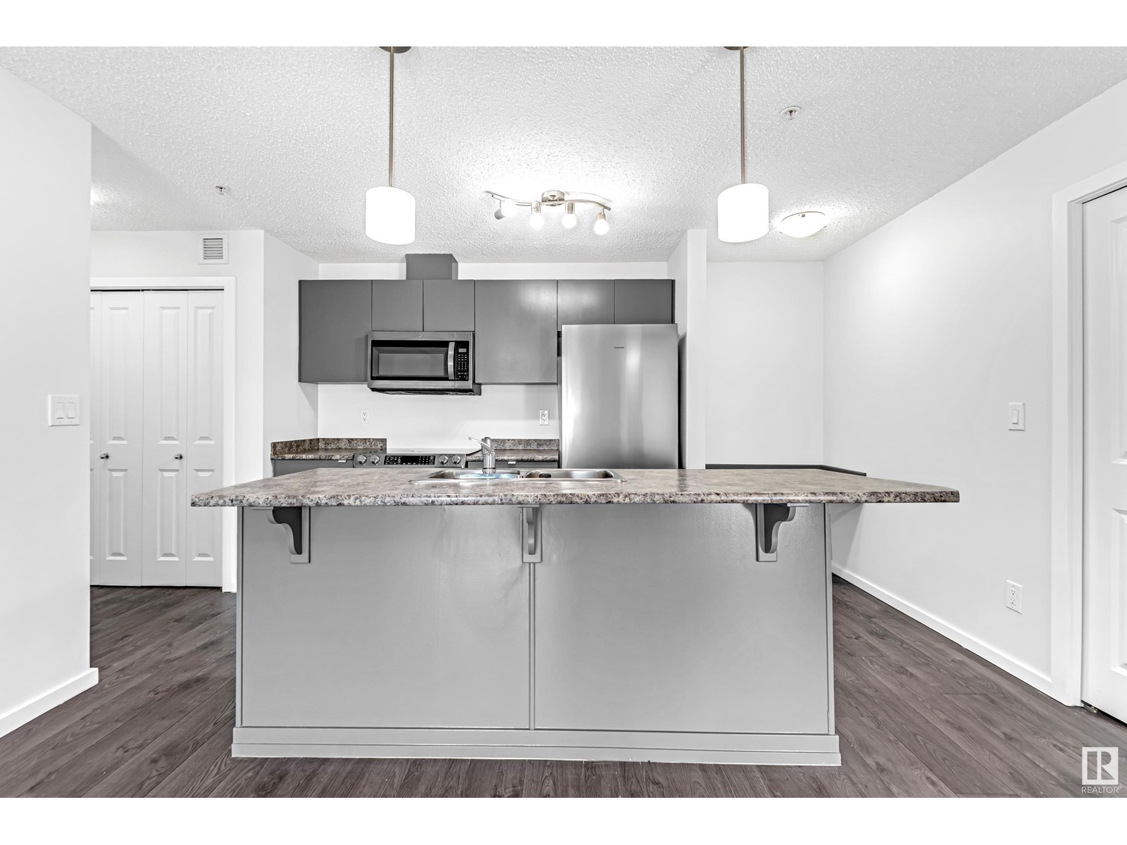 Property at #115 3357 16A AV NW image 1