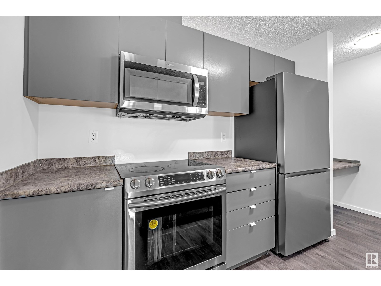 Property at #115 3357 16A AV NW image 4