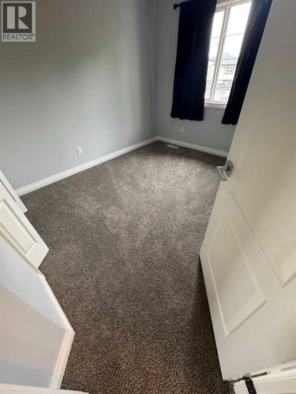 14 Garneau Gate, Carstairs, Alberta  T0M 0N0 - Photo 24 - A2219559