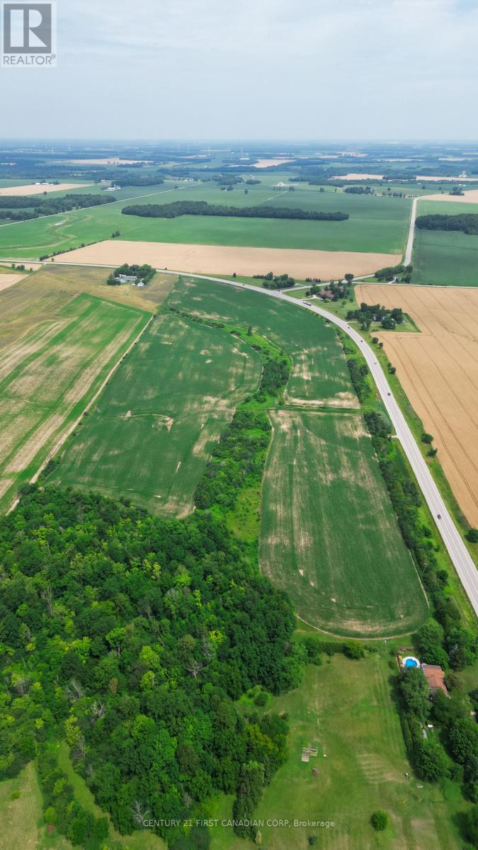 This picturesque county property close to London and minutes to Strathroy with approximately 46 workable acres. Good Road exposure ! (possible future development potential.). its presently a part of 69 acres property with a beautiful and solid 5000 sq. feet home with a four car garage. its subject to getting severance! (id:48254)