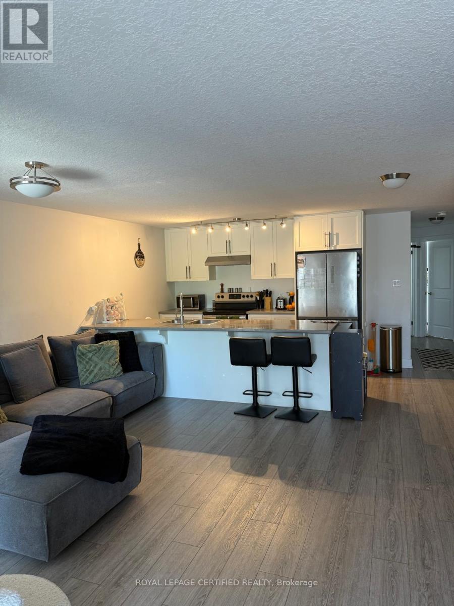 202 - 17 Centre Street, Orangeville, Ontario  L9W 2W9 - Photo 5 - W12286504