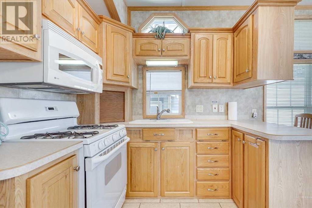 4032, 25054 South Pine Lake Road, Rural Red Deer County, Alberta  T0M 1R0 - Photo 6 - A2227149