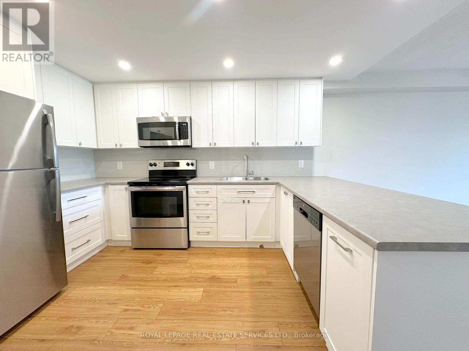 311 - 190 Clark Boulevard, Brampton, Ontario  L6T 4A8 - Photo 2 - W12287528