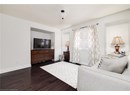 Living room featuring wood finished floors and baseboards