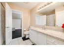 Full bathroom featuring vanity and tile patterned floors