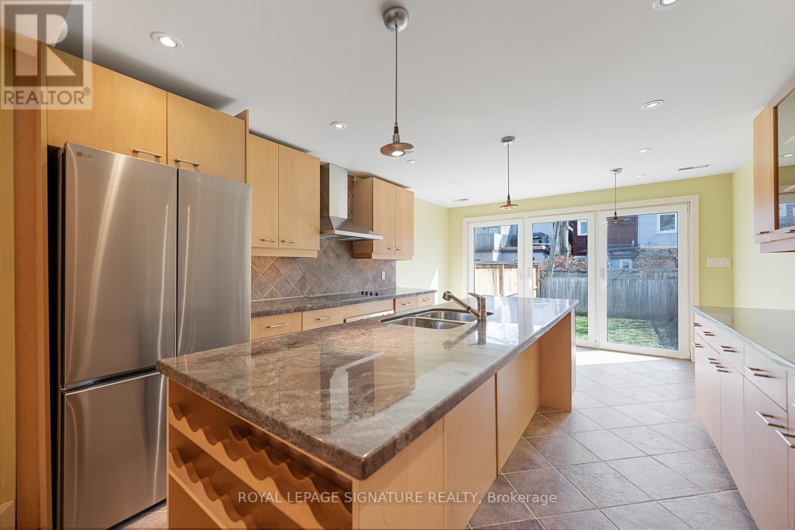 99 Kent Road, Toronto, Ontario  M4L 2X5 - Photo 14 - E12288212