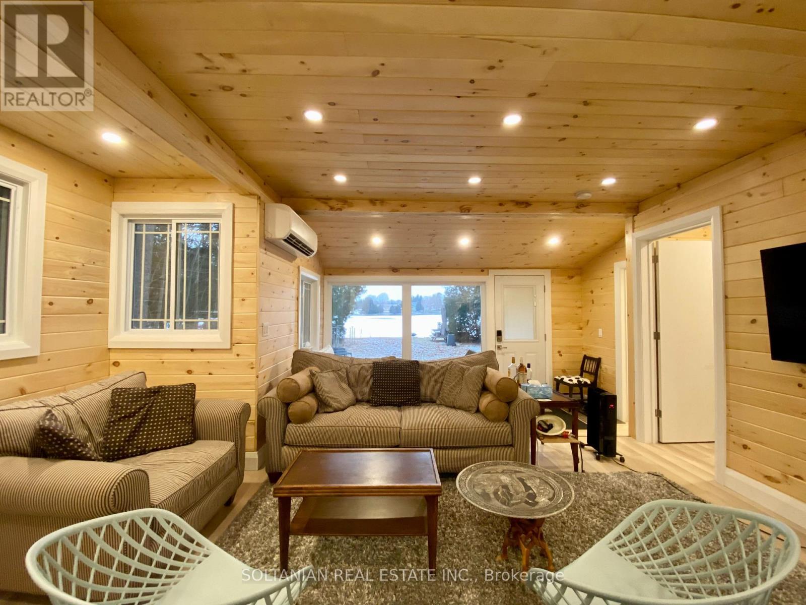 29 Paradise Road, Kawartha Lakes (Carden), Ontario  K0M 1B0 - Photo 4 - X12226686