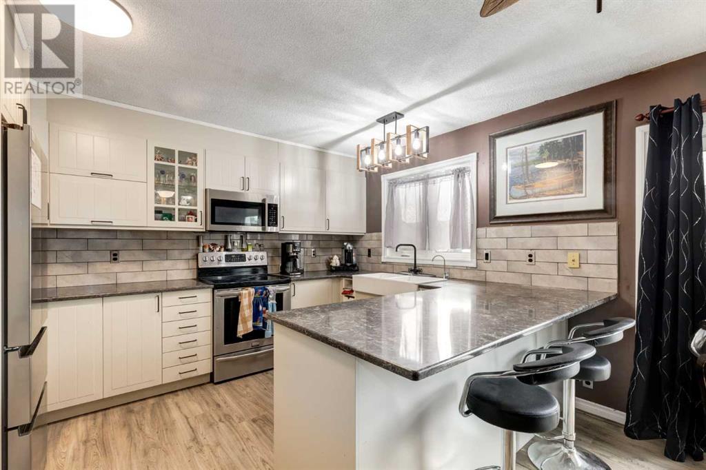 23 Beaver Place, Beiseker, Alberta  T0M 0G0 - Photo 6 - A2226341