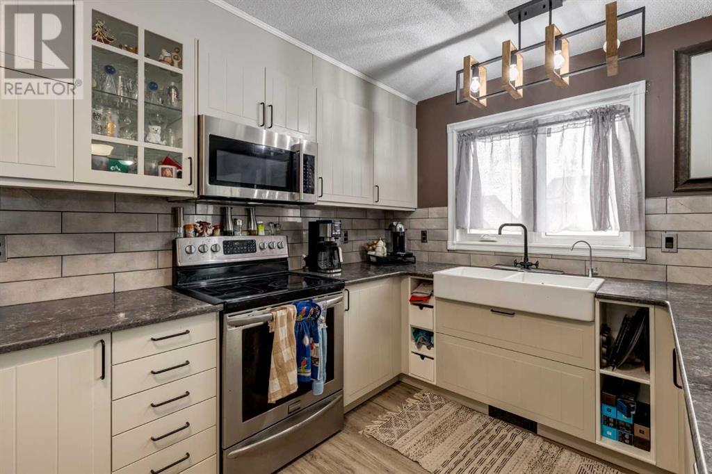 23 Beaver Place, Beiseker, Alberta  T0M 0G0 - Photo 1 - A2226341