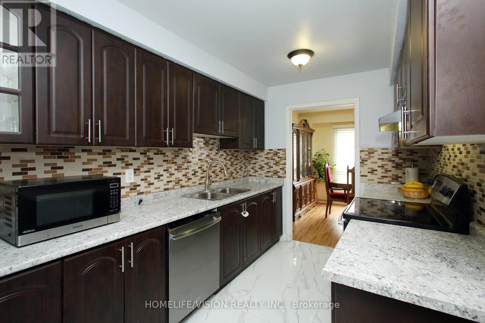 15 - 3430 Brandon Gate Drive, Mississauga (Malton), Ontario  L4T 3T4 - Photo 12 - W12289264