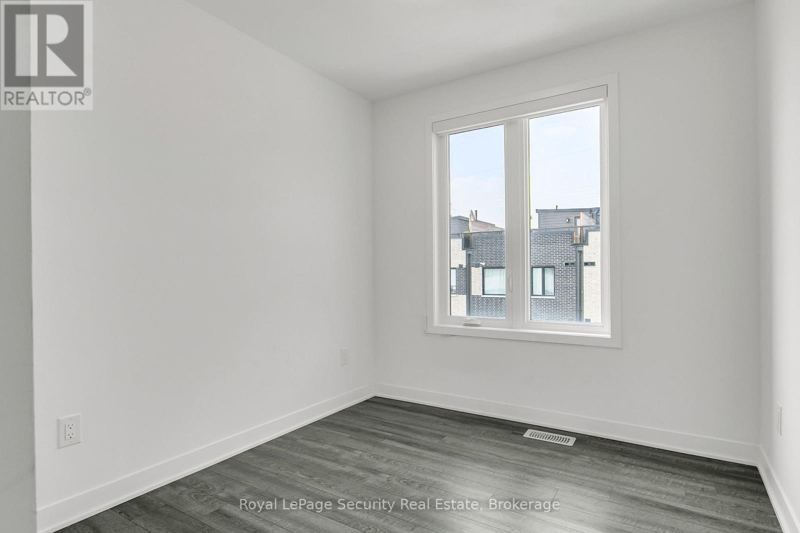 Th 22 - 40 Ed Clark Gardens, Toronto, Ontario  M6N 0B5 - Photo 29 - W12290461