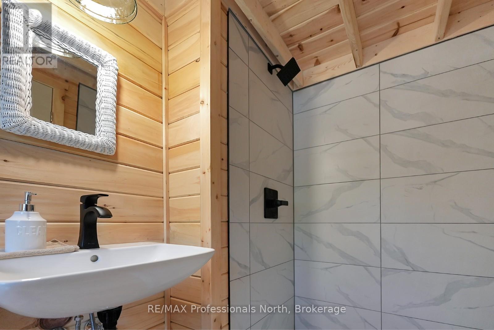 1414 Tennyson Road, Minden Hills, Ontario  K0M 2K0 - Photo 10 - X12292024