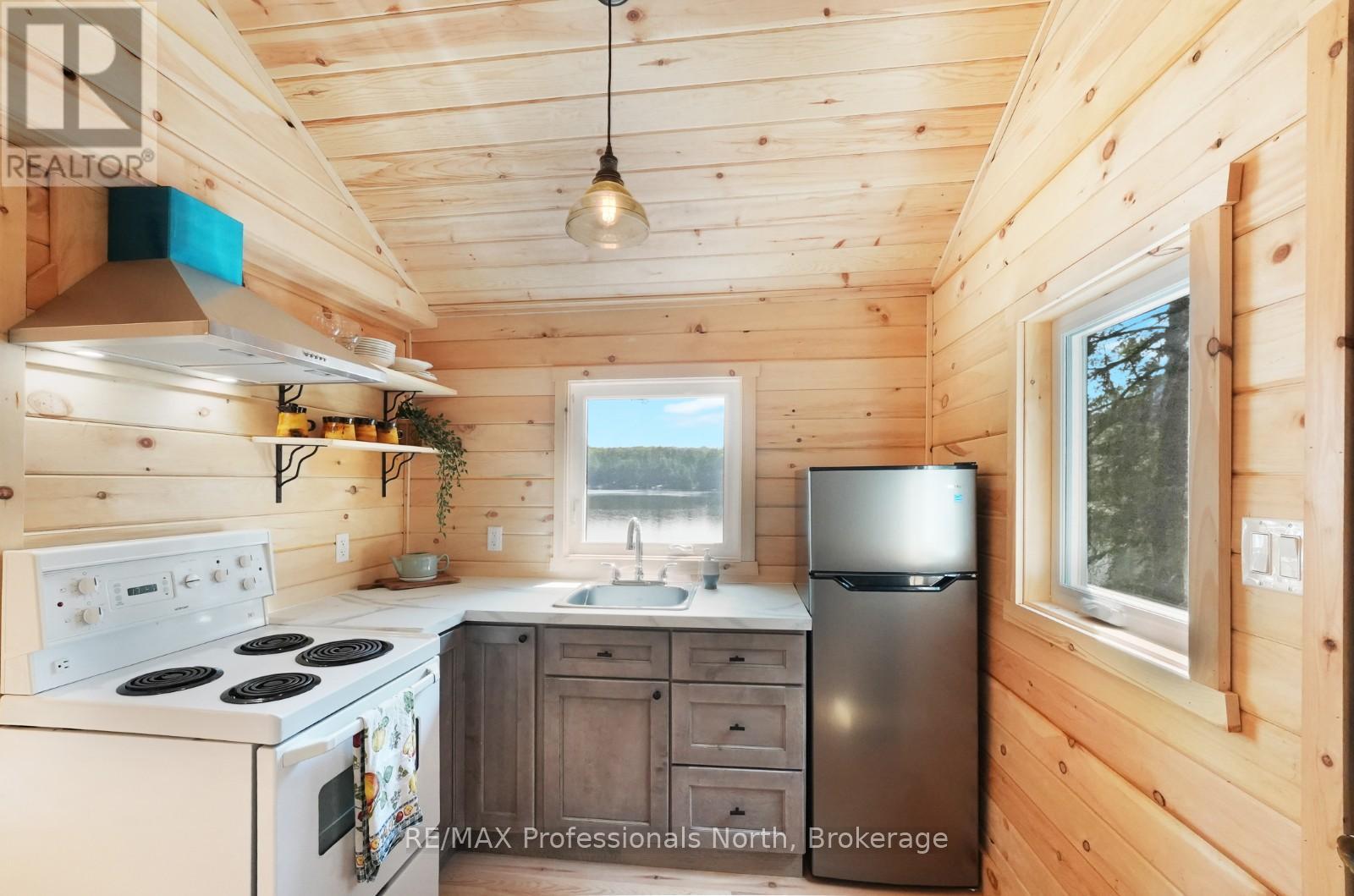 1414 Tennyson Road, Minden Hills, Ontario  K0M 2K0 - Photo 6 - X12292024