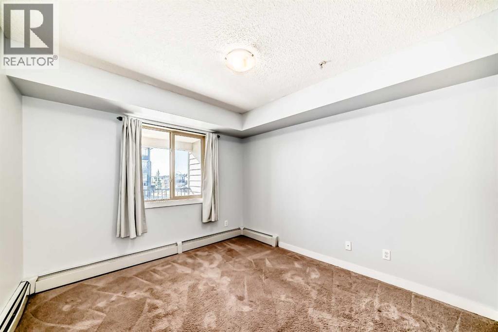 205, 5 Saddlestone Way Ne, Calgary, Alberta  T3J 0S2 - Photo 18 - A2220772
