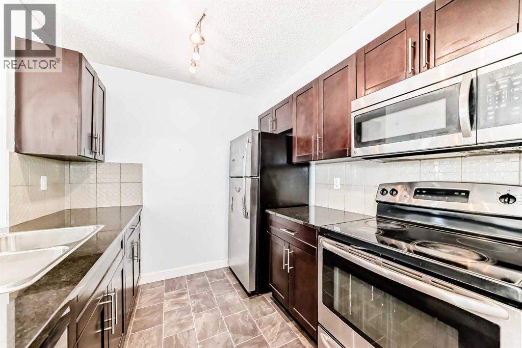 205, 5 Saddlestone Way Ne, Calgary, Alberta  T3J 0S2 - Photo 9 - A2220772