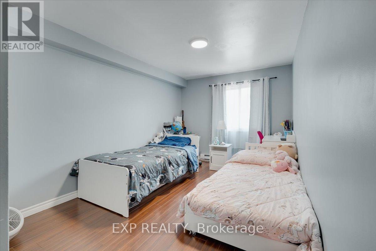 14 - 300 Traynor Avenue, Kitchener, Ontario N2C 2J1 - Photo 11 - X12293012