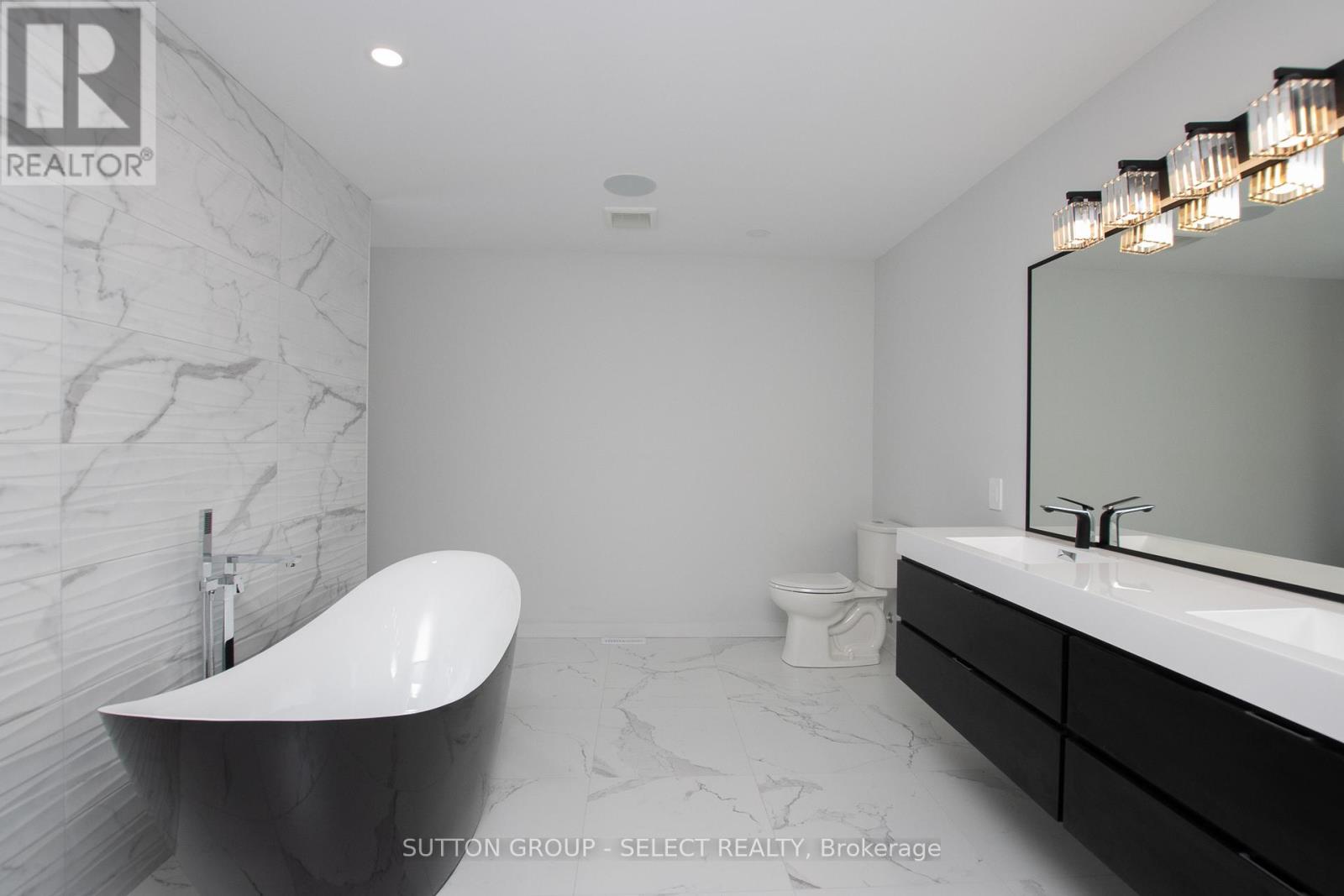 115 Optimist Drive, Southwold, Ontario  N5P 3T2 - Photo 24 - X12293107