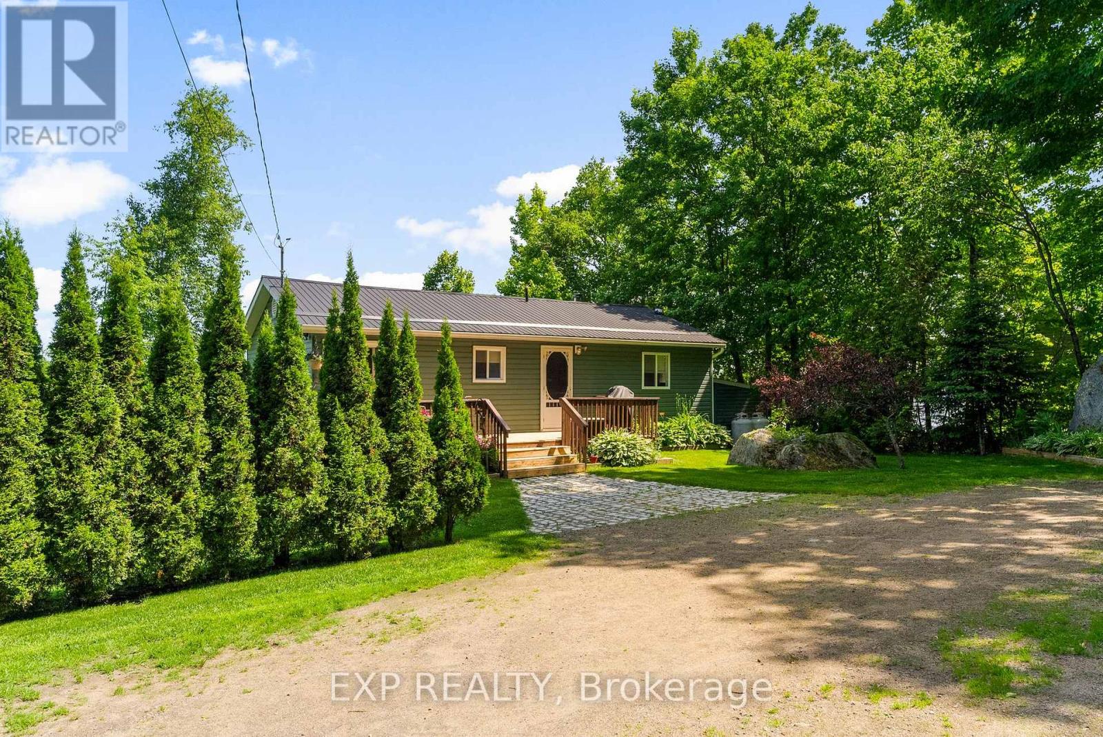 1128 Kamaniskeg Lake Road, Hastings Highlands (Bangor Ward), Ontario  K0J 1L0 - Photo 4 - X12250612
