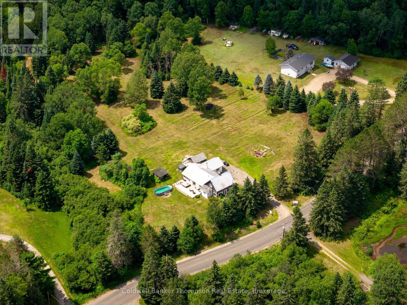 <div class="slider-price">$489,900</div><p>1516 Williamsport Road, Huntsville, Ontario</p>