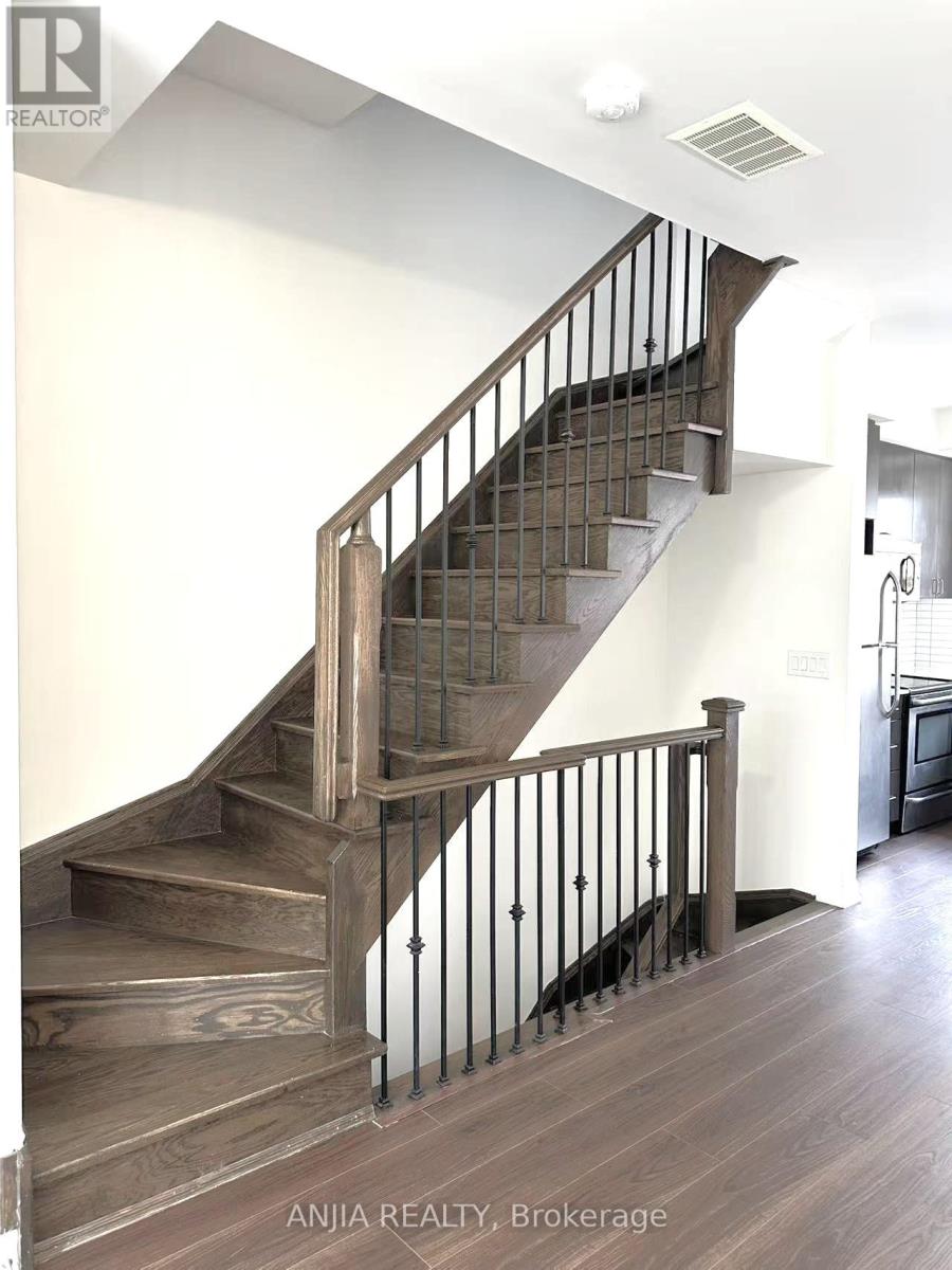 22 Frederick Tisdale Drive, Toronto, Ontario  M3K 0B2 - Photo 6 - W12296204