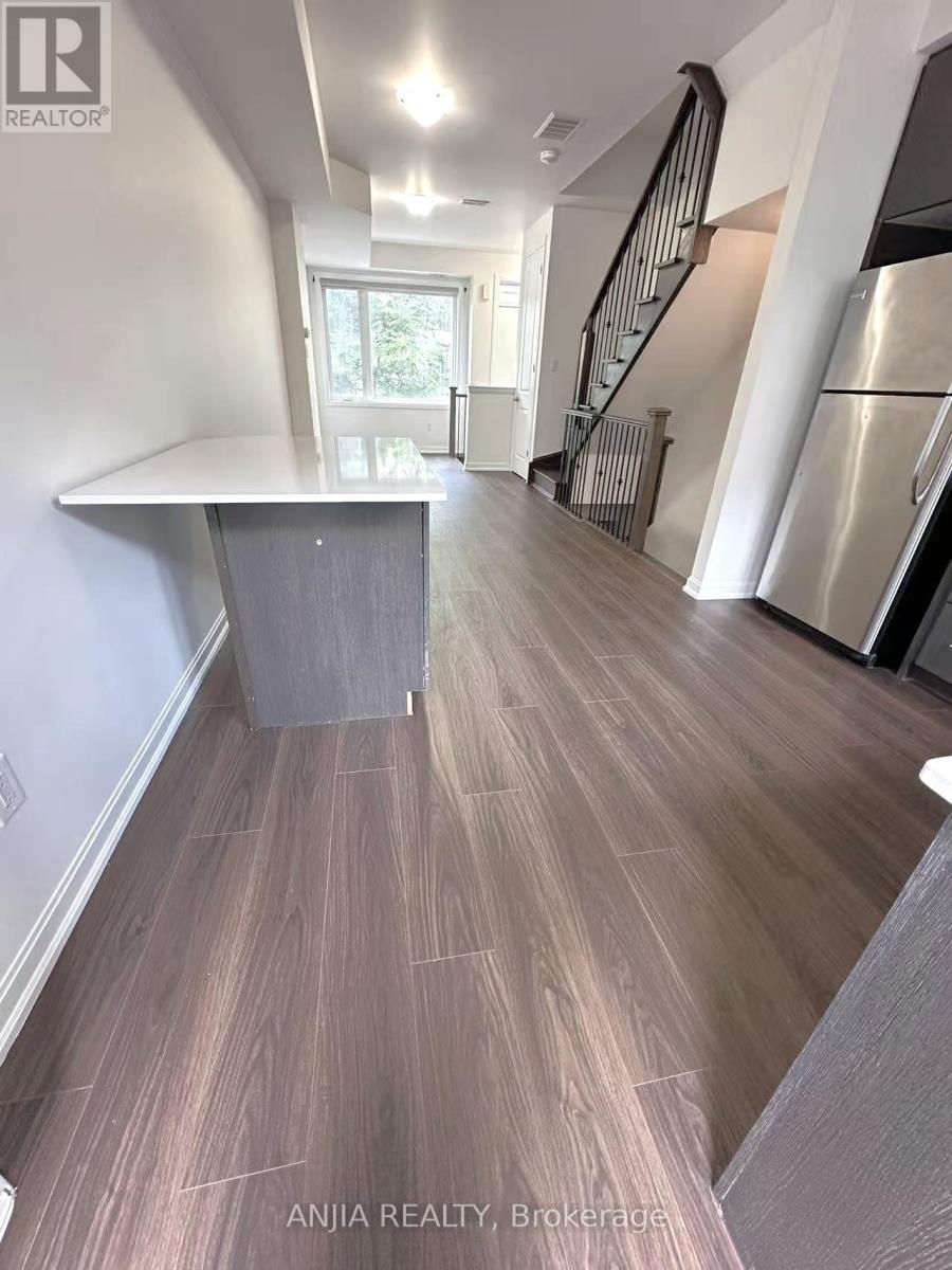 22 Frederick Tisdale Drive, Toronto, Ontario  M3K 0B2 - Photo 7 - W12296204
