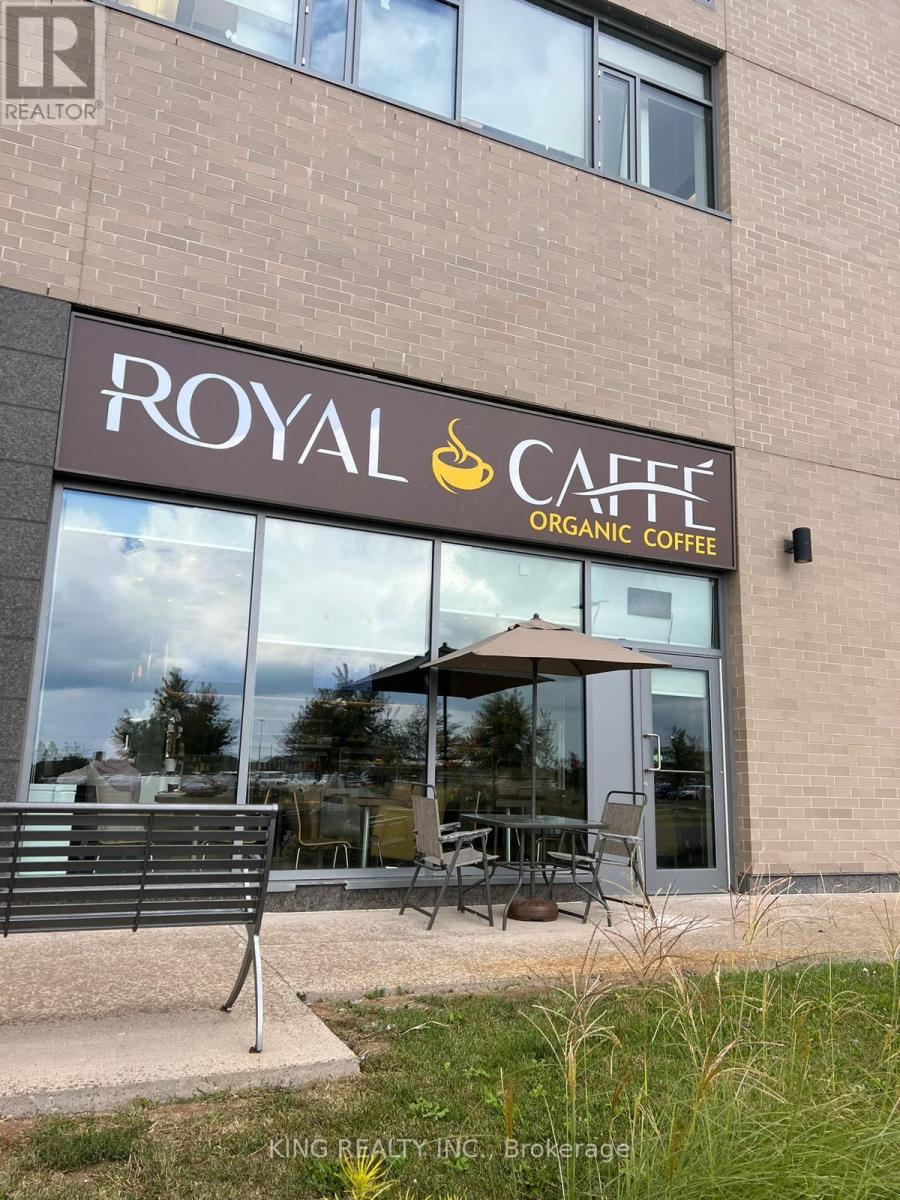 107 - 3075 Hospital Gate, Oakville, Ontario  L6M 1M1 - Photo 1 - W12296399