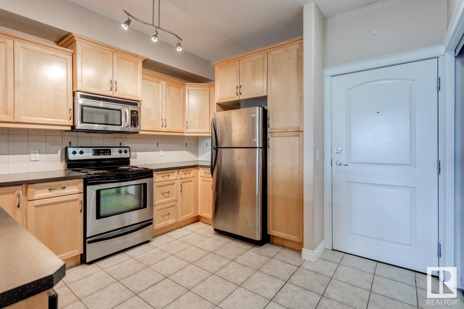 Property at #212 12408 15 AV SW image 5