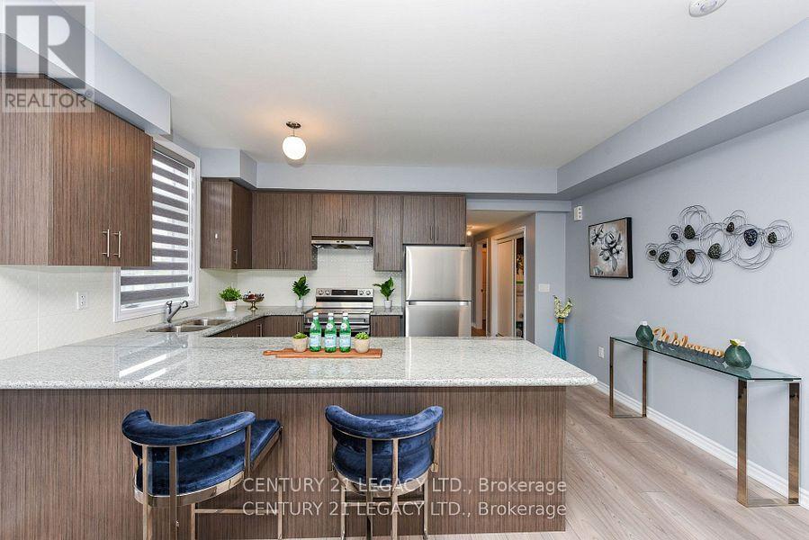 712 - 60 Halliford Place, Brampton, Ontario  L6P 0N5 - Photo 1 - W12300288