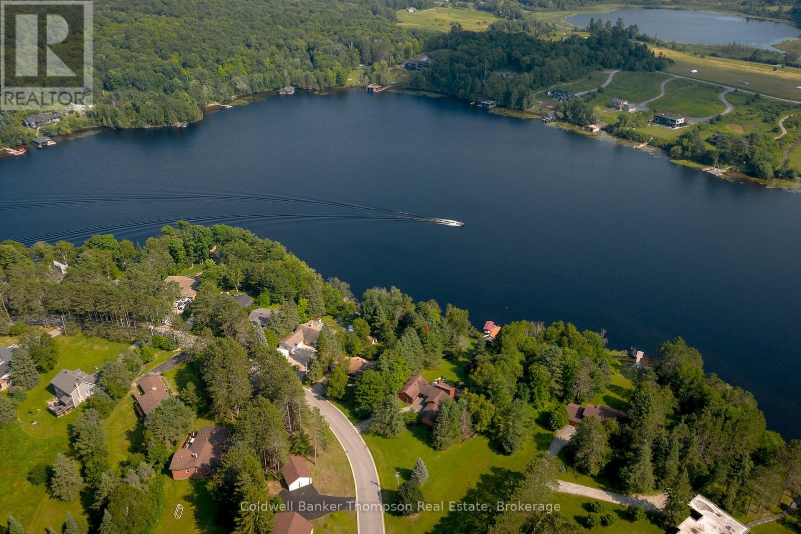 <div class="slider-price">$1,490,000</div><p>281 Echo Bay Road, Huntsville, Ontario</p>