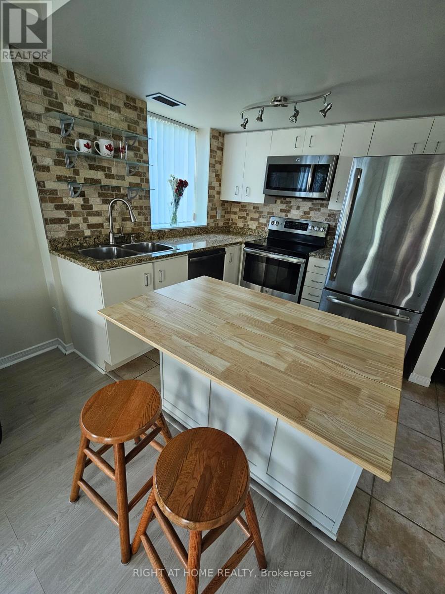 503 - 2565 Erin Centre Boulevard, Mississauga (Central Erin Mills), Ontario  L5M 6Z8 - Photo 4 - W12301174