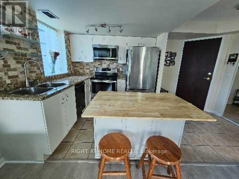 503 - 2565 Erin Centre Boulevard, Mississauga (Central Erin Mills), Ontario  L5M 6Z8 - Photo 5 - W12301174