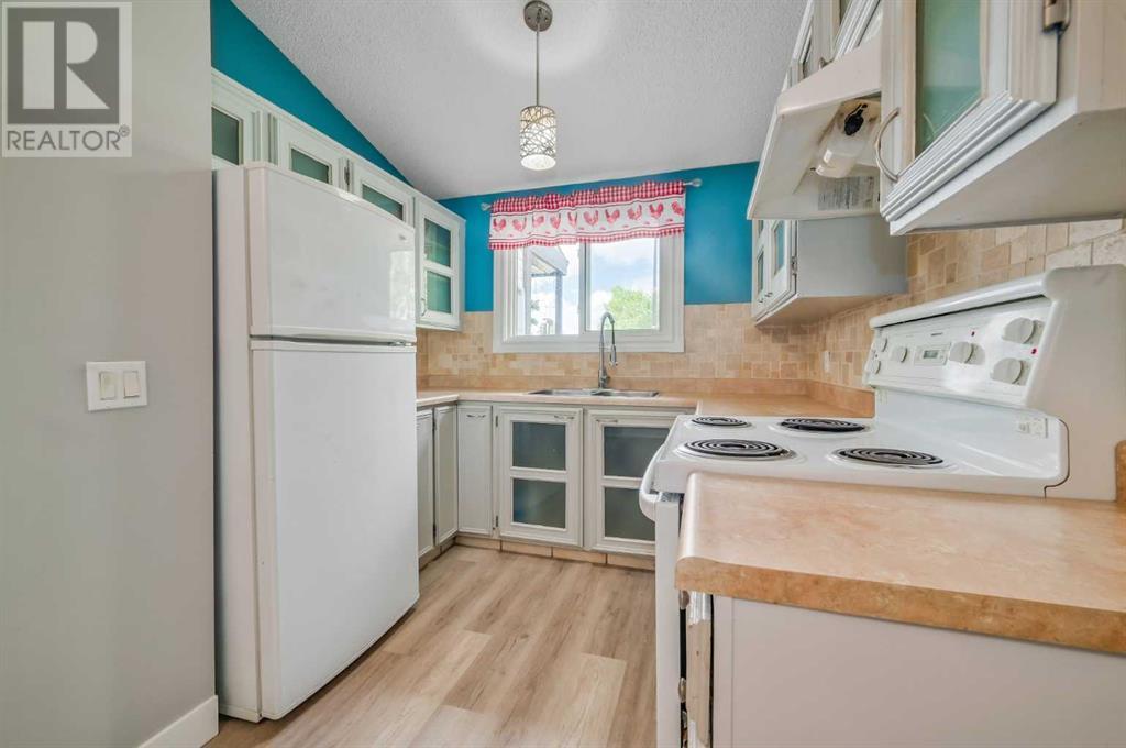 1426 Ranchlands Way Nw, Calgary, Alberta  T3G 1R2 - Photo 6 - A2241068