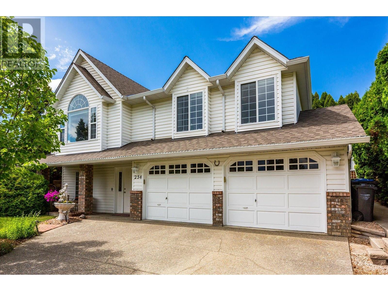 254 Moubray Road Kelowna, British Columbia Situated in the heart of North Glenmore, this well-maintained home is ideal for families seeking comfort, space, and convenience. The upper level features three full bedrooms, including a primary suite with a private ensuite, along with a bright and spacious kitchen and a living room that boasts vaulted ceilings and large windows, flooding the space with natural light. Step directly from the kitchen into the private backyard—perfect for entertaining—complete with a large covered deck, a newer hot tub, and a fantastic outdoor movie setup featuring a 100"" electric screen, outdoor speakers, and projector. The main floor offers a generously sized office that could easily serve as a fourth bedroom, a full bathroom, laundry area, and a great rec room ideal for kids or casual gatherings. With thoughtful updates throughout and clear pride of ownership, this home offers a perfect blend of function and lifestyle. Check out the virtual tour at: https://unbranded.youriguide.com/xktnc_254_moubray_rd_kelowna_bc/ Call your favourite Realtor to view. (id:48254)
