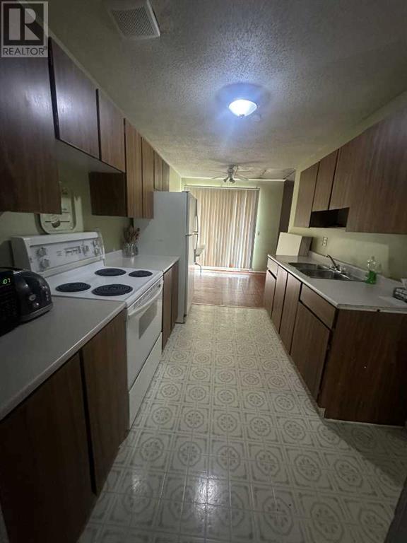 1-4, 605 12 Avenue, Hanna, Alberta  T0J 1P0 - Photo 4 - A2220252