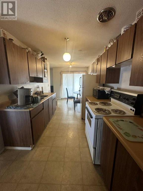 1-4, 605 12 Avenue, Hanna, Alberta  T0J 1P0 - Photo 8 - A2220252