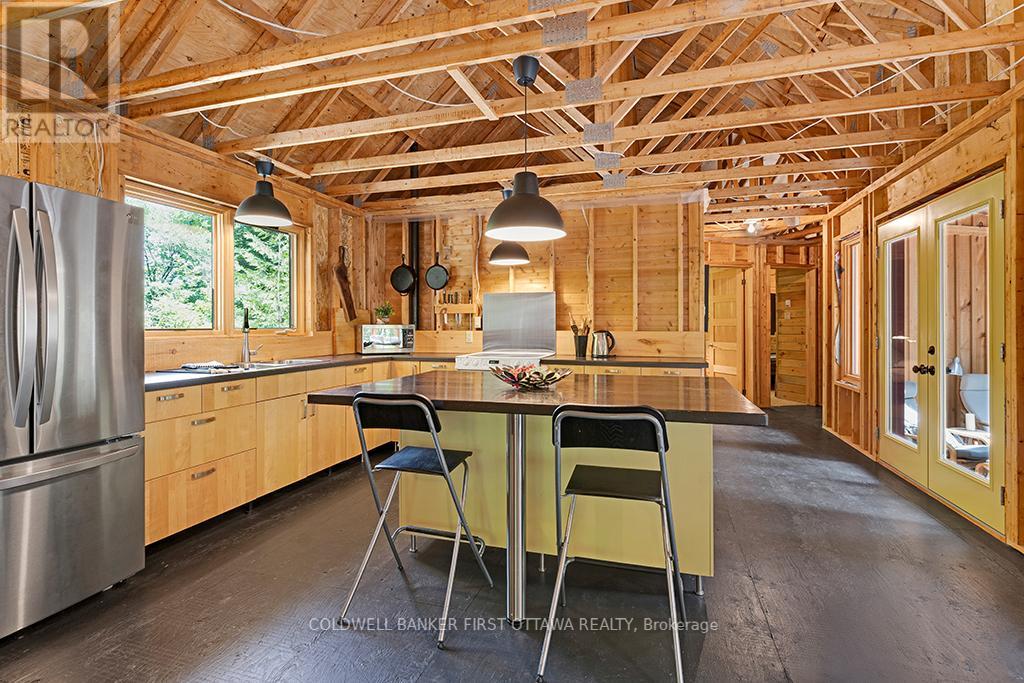 1245 North Shore Estates Lane, Frontenac, Ontario  K0H 2J0 - Photo 15 - X12302650